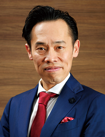 コスモヘルス株式会社　代表取締役社長 小塚 崇史